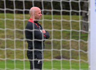 Liverpool manager Arne Slot oversees training in July 2024.