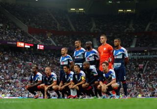 The Great Britain team line up before the Men's Football first round Group A Match of the London 2012 Olympic Games between Great Britain and Senegal, at Old Trafford on July 26, 2012 in Manchester, England.