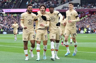 Joao Felix (C) of Chelsea celebrates with teammates Reece James (L) and Noni Madueke (2R) after scoring the team's first goal during the Premier League match between West Ham United and Chelsea FC at London Stadium on February 11, 2023 in London, England.